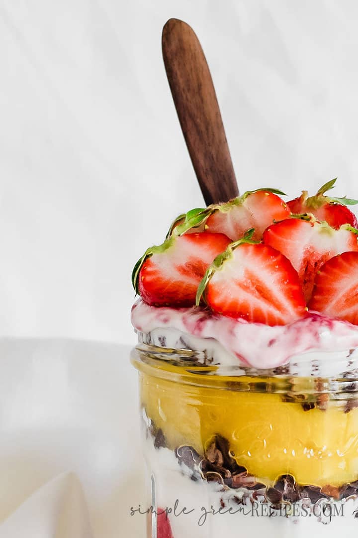 Close up of the Gluten-free Strawberry Parfait topped with coconut cream and strawberries.