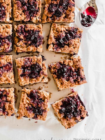 Close up of the Vegan Blueberry Oatmeal Bars sliced into 16 bars.