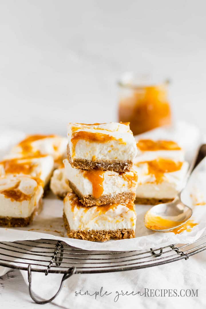  Eye-level shot of the Vegan Cheesecake stack with the peach jam jar behind