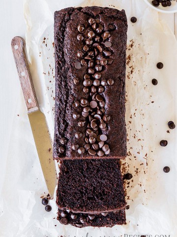 Over head shot of a loaf bread topped with chocolate chips.