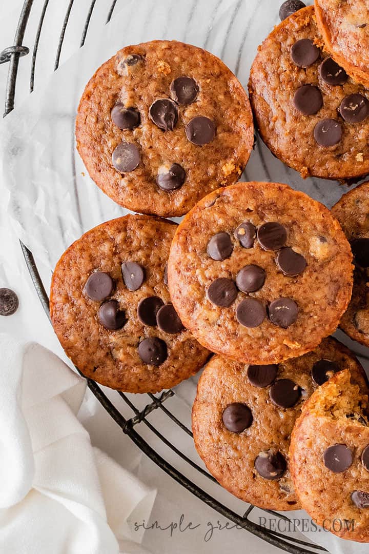 Closeup of the pumpkin cookies on a vintage rack.