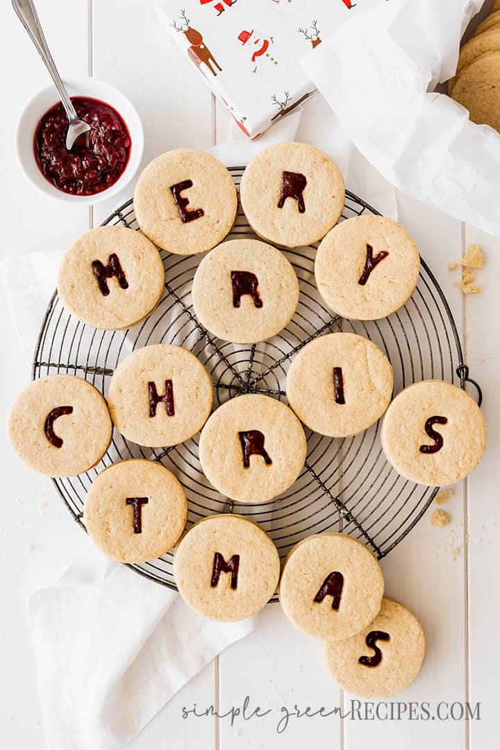 Over head shot of the Linzer Cookies, jam and a box of cookies.