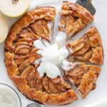 cut apple galette with ice cream on top