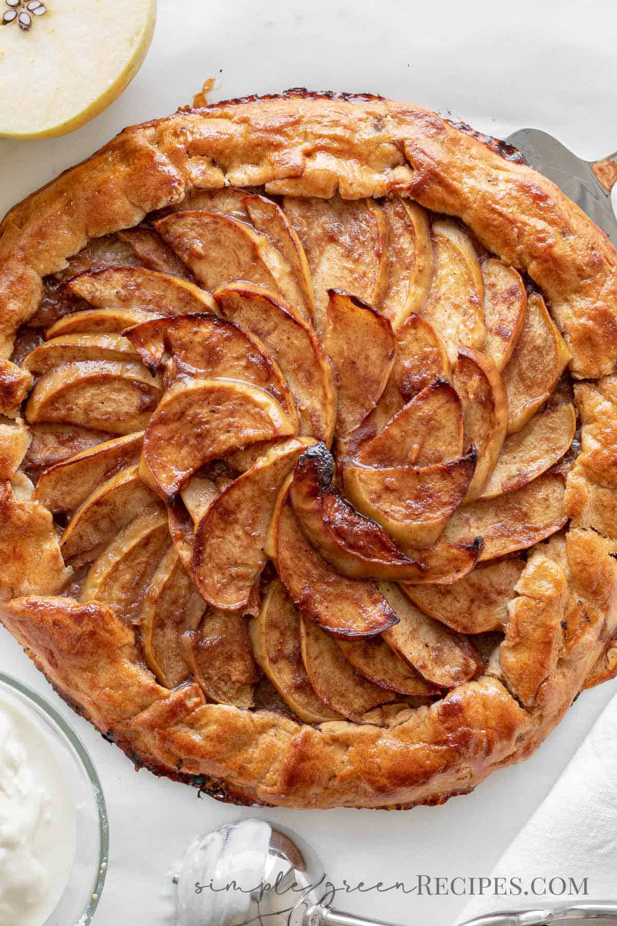 apple galette on a white surface
