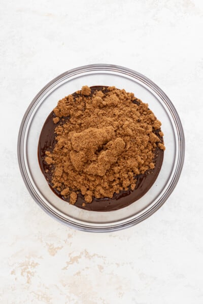 glass bowl filled with brown sugar and melted chocolate
