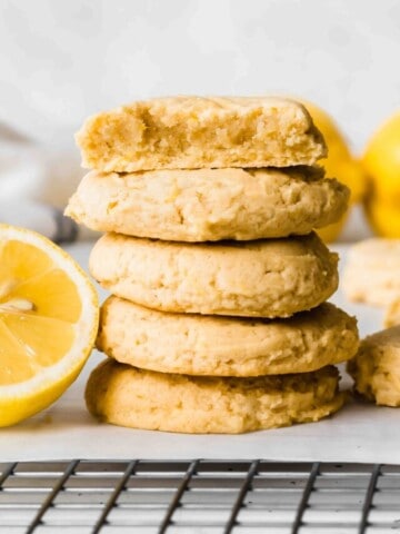 Stack of lemon cookies on a cooling rack